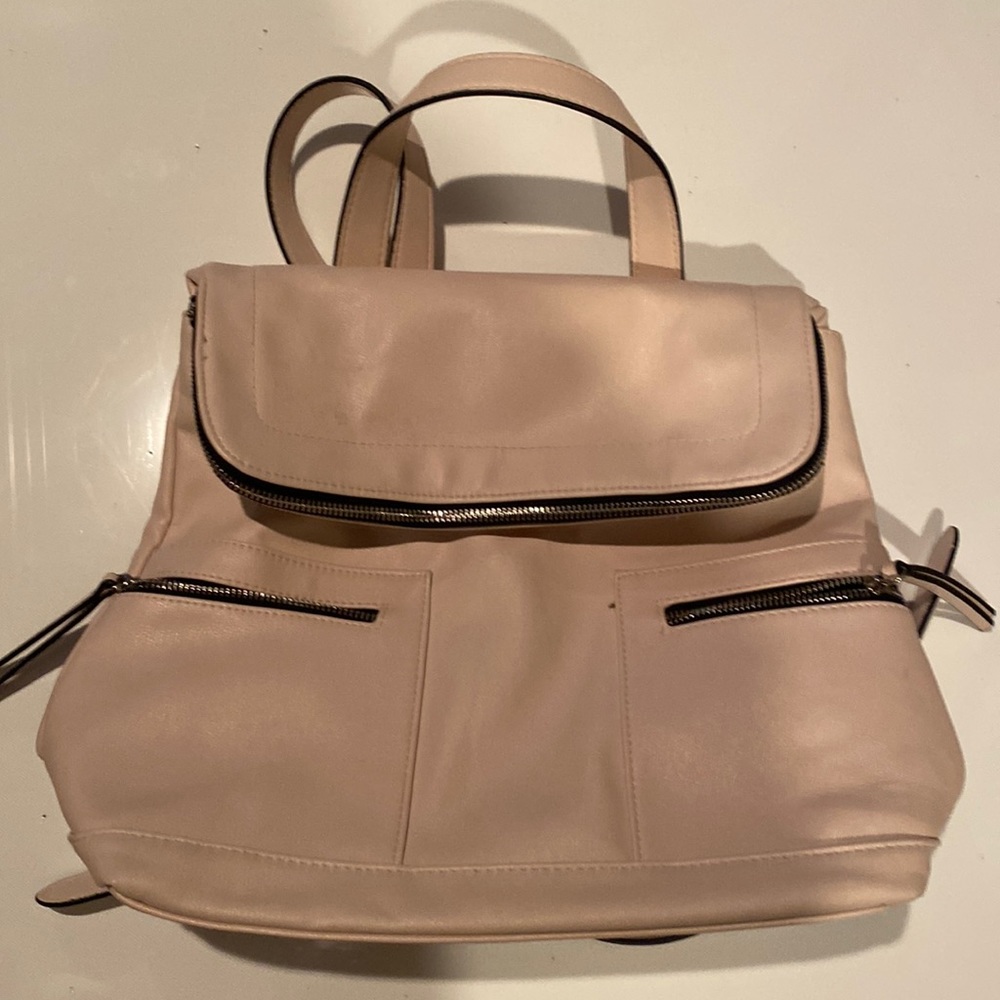 Backpack light pink.